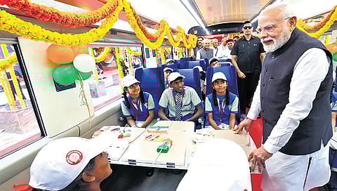 PM Modi interacts with children aboard Bengaluru-Belagavi Vande Bharat Express