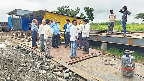 An expert team inspects the crest gate no 19 installation work of TB Dam.
