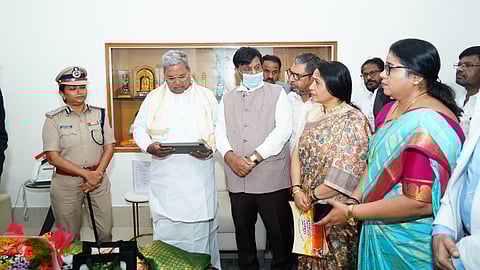 Cm Siddaramaiah with Mysuru district administration officials.