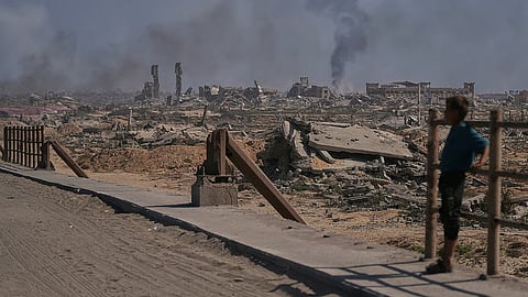 smoke rising into the sky following an Israeli military strike in Gaza City