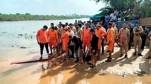 Rescue operations at Kheragarh during Durga Puja immersion, in Agra, Uttar Pradesh