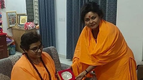 Puja Shakun Pandey with BJP leader Pragya Singh Thakur