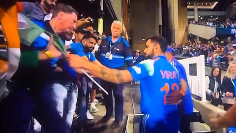 Virat Kohli returned the flag to a fan after the Sydney ODI