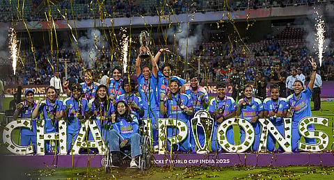 Indias players celebrate with the trophy during the presentation ceremony after winning the ICC Womens World Cup 2025, at the DY Patil Stadium, in Navi Mumbai