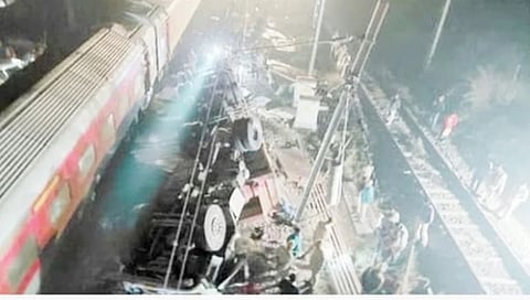 Narrow escape for passenger train as speeding truck falls on tracks from overbridge