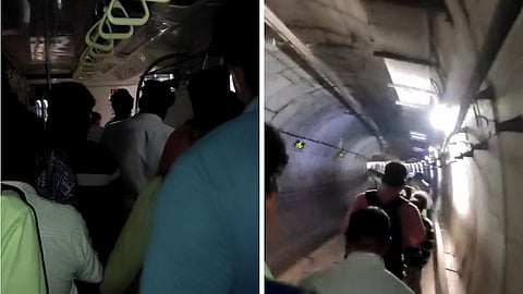 Commuters Forced To Walk Through Tunnel