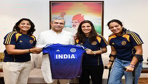 The three players with Railway Minister Ashwini Vaishnaw.