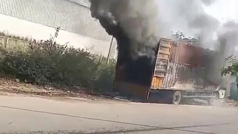 Bike carrying truck catch fire in Bellary