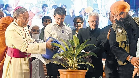 MLA Rizwaz Arshad and Karnataka Lokayukta Justice B S Patil with religious leaders observe Minority Rights Day on Thursday 