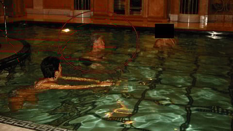 Former US President Bill Clinton was seen alongside Epstein associate Ghislaine Maxwell and another woman in the new Epstein files. (DOJ)