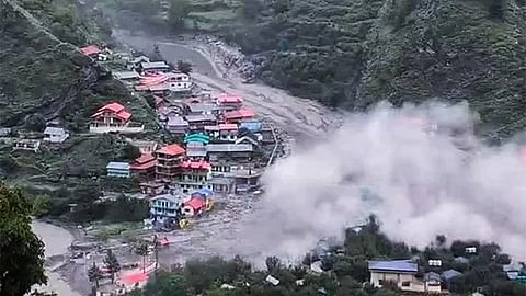 Houses being swept away in a flash flood triggered by a cloudburst at Dharali, in Uttarkashi district, Uttarakhand, Tuesday