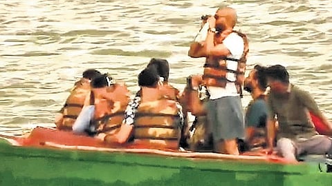 The alleged illegal operation of boat services and safaris by private resorts in Kabini