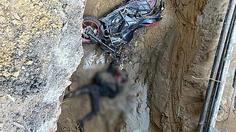 The victim, identified as Kamal, a resident of Kailashpuri, was found dead inside the pit along with his motorcycle early Friday morning.