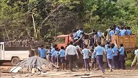 school children transported in goods vehicles