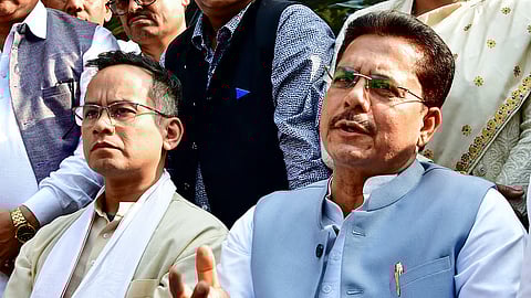 Former Assam Pradesh Congress Committee president Bhupen Kumar Borah addresses a press conference after submitting his resignation 