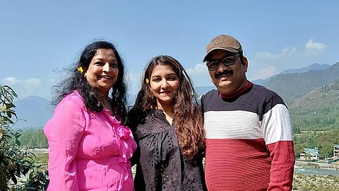 Asawari Jagdale with her parents.