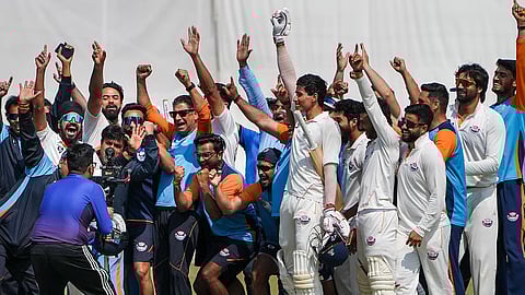 J&K's Vanshaj Sharma with teammates celebrates after the team's victory in the Ranji Trophy semifinal cricket match.