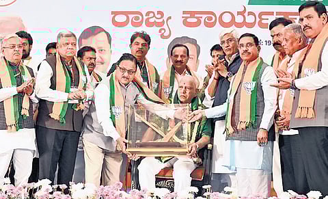 B S Yediyurappa being felicitated by BJP leaders for his 50 years of public service