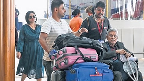 Passengers stranded at KIA in Bengaluru on Sunday.