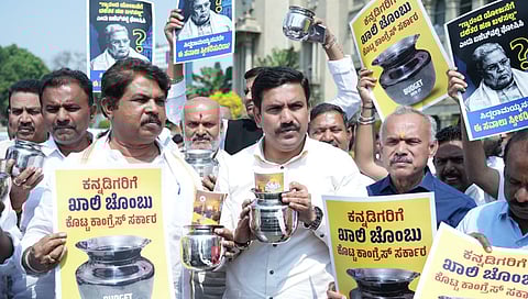 BJP stages 'Khaali Chambu' protest against CM Siddaramaiah's 17th budget