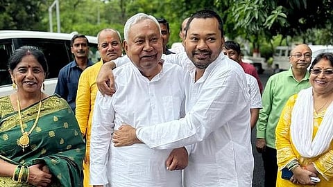 Nitish Kumar greets his son Nishant Kumar on his birthday, in Patna. 
