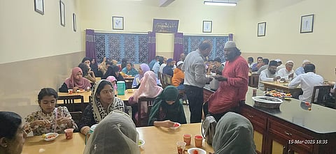 People gather to break the fast at an Iftar hosted by Meenakshi Srinivasan in Bengaluru last year.