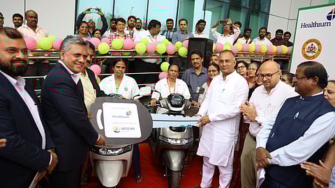 Dinesh Gundu Rao distributed  e-bikes