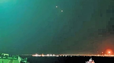 Drones seen in a screengrab of a video captured by the sailor from his vessel at the Strait of Hormuz