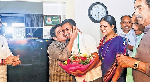 Housing Minister BZ Zameer Ahmed Khan wishes Congress Davanagere South candidate Samarth Shamanur in Davanagere on Sunday