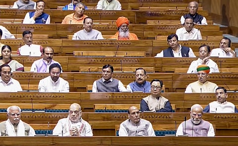 Prime Minister Narendra Modi, Union Home Minister Amit Shah, Defence Minister Rajnath Singh, and other members in the Lok Sabha.