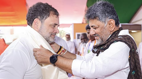 DCM D K Shivakumar felicitating LoP in LS Rahul Gandhi at Ponneri in Tamil Nadu on Saturday.
