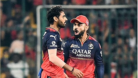 Bhuvneshwar Kumar with Virat Kohli
