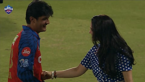 Preity Zinta giving a friendly punch to Priyansh Arya.