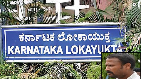 ಲಂಚ ಪಡೆದು ಸಿಕ್ಕಿಬಿದ್ದಿರುವ ರಾಜ್ ಕುಮಾರ್ (ಒಳಚಿತ್ರ)