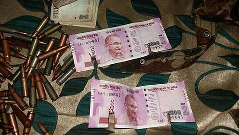ಉಗ್ರರ ಬಳಿ ಪತ್ತೆಯಾದ ಹೊಸ ನೋಟು (ಎಎನ್ ಐ ಚಿತ್ರ)