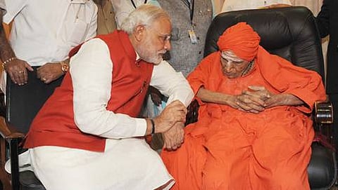 ಪ್ರಧಾನಮಂತ್ರಿ ನರೇಂದ್ರ ಮೋದಿ ಹಾಗೂ ಶಿವಕುಮಾರ ಸ್ವಾಮೀಜಿ (ಸಂಗ್ರಹ ಚಿತ್ರ)