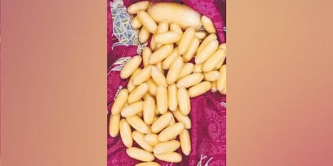 ಕ್ಯಾಪ್ಸುಲ್‌ಗಳಲ್ಲಿ ತುಂಬಿರುವ ಕೊಕೇನ್