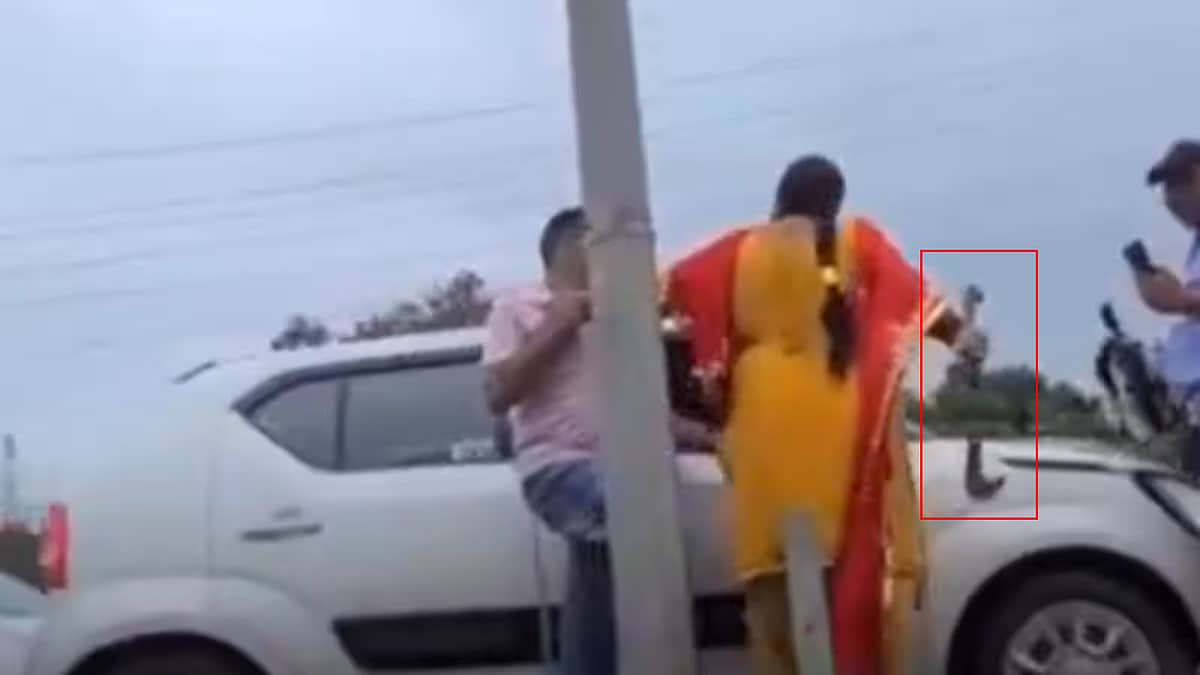Road Rage: ಲಾಂಗ್ ತೆಗೆದು ಬೆದರಿಸಿದ 'ಲೇಡಿ', video