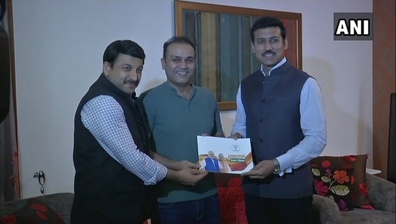 ಸಮರ್ಥನೆಗಾಗಿ ಸಂಪರ್ಕ ಪ್ರಚಾರ: ಸೆಹ್ವಾಗ್  ಭೇಟಿ ಮಾಡಿದ ರಾಜ್ಯವರ್ಧನ್ ರಾಥೋರ್