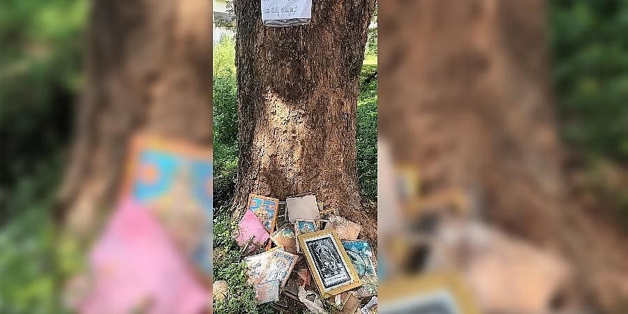 ಹುಬ್ಬಳ್ಳಿಯಲ್ಲಿ ಜನರಿಗೆ ಎಚ್ಚರಿಕೆ ನೀಡಲು ವಿಶಿಷ್ಟ ಉಪಾಯ: 'ಒಡೆದ ದೇವರ ಫೋಟೋ ಫ್ರೇಮ್ ಮರದ ಕೆಳಗೆ ಇಟ್ಟರೆ ನಿಮಗೆ...'!