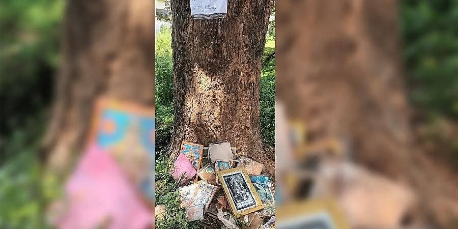 ಹುಬ್ಬಳ್ಳಿಯಲ್ಲಿ ಜನರಿಗೆ ಎಚ್ಚರಿಕೆ ನೀಡಲು ವಿಶಿಷ್ಟ ಉಪಾಯ: 'ಒಡೆದ ದೇವರ ಫೋಟೋ ಫ್ರೇಮ್ ಮರದ ಕೆಳಗೆ ಇಟ್ಟರೆ ನಿಮಗೆ...'!