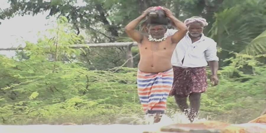 ಕೆರೆ ಕೋಡಿ ಬಿದ್ದಿದ್ದರಿಂದ ಕೋಣ ಬಲಿ, ದಲಿತ ವ್ಯಕ್ತಿಯ ತಲೆ ಮೇಲೆ ರುಂಡವನ್ನಿಟ್ಟು ಮೆರವಣಿಗೆ!